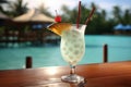 Delicious pina colada cocktail served on a beautiful tropical beach with copy space