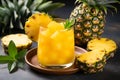 Delicious pineapple juice with fresh ripe pineapple, refreshing tropical beverage Royalty Free Stock Photo