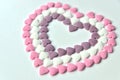 Delicious pink ValentineÃÂ´s Day sugar hearts and ornaments in pink, purple and white show I love you to your beloved girlfriend Royalty Free Stock Photo