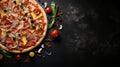 Delicious pizza with assorted toppings on black stone background, top view with empty space for text Royalty Free Stock Photo