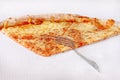 Delicious pizza Margherita with fork and knife. Take out freshly baked Italian traditional classic pizza being held in a box. Royalty Free Stock Photo