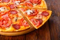 Delicious pizza with mushrooms, chili and pepperoni Royalty Free Stock Photo