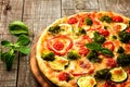 Pizza served on wooden plate Royalty Free Stock Photo