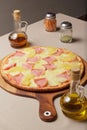 Delicious pizza served on wooden plate  - Imagen Royalty Free Stock Photo