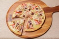 Delicious pizza served on wooden plate  - Imagen Royalty Free Stock Photo