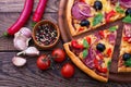 Delicious pizza served on wooden table top view Royalty Free Stock Photo