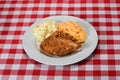 A delicious plate of fried chicken with sides