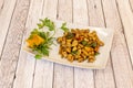 Delicious plate of kung pao chicken with nuts, pickled corn, Chinese vegetables Royalty Free Stock Photo