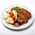 Delicious Plate of Meatloaf and Mashed Potatoes on a white background Royalty Free Stock Photo