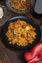 Delicious plate of Valencian paella with chicken and vegetables
