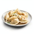 Delicious Polish Pierogi with Sour Cream on a Plate for Your Next Recipe Book.
