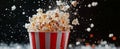 Delicious popcorn bursting from a classic striped container in a dynamic display
