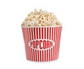 Delicious popcorn in paper bucket isolated
