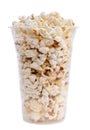 Popcorn in plastic cup on white Royalty Free Stock Photo