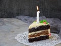 Delicious poppy cake with nut biscuit and cheese cream on light background. Happy Birthday. Copy space