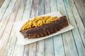 Delicious pork ribs marinated with barbecue sauce garnished with French fries