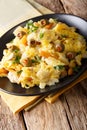 Delicious Portuguese cuisine: Bacalhau Bass cod with potatoes, o Royalty Free Stock Photo