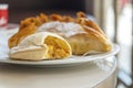 Delicious portuguese traditional pastry from Coimbra on white plate