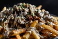 Delicious poutine with mushrooms and cheese sauce