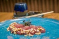 Delicious premium tuna sashimi arranged on an elegant handmade platter