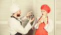 Delicious proposal. Man chef offer dessert or meal under cloche to girl. Will you eat my meal. Culinary family. Woman