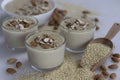 Delicious Proso Millet Kheer in a glass bowl, adorned with crunchy almonds, showcasing a nutritious dessert Royalty Free Stock Photo