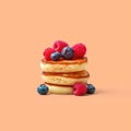 Delicious puff cottage cheese pancakes with fresh blueberries and raspberies, generative AI