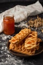 Delicious puff pastry with apricot jam on the background Royalty Free Stock Photo