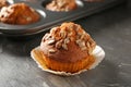 Delicious pumpkin muffin with sunflower seeds on table Royalty Free Stock Photo