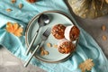 Delicious pumpkin muffins with sunflower seeds on plate Royalty Free Stock Photo