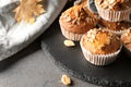 Delicious pumpkin muffins with sunflower seeds on table Royalty Free Stock Photo