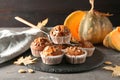 Delicious pumpkin muffins with sunflower seeds on table Royalty Free Stock Photo