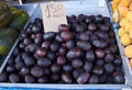 Delicious purple avocado on Sunday market in Spain, Mercadillo de Campo de Guardamar.