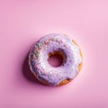 Delicious purple donut topped with colorful sprinkles on vibrant pink background. For advertise cafe, pastry shop Royalty Free Stock Photo