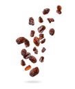 Delicious raisins in the air, isolated on a white background