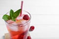 Delicious raspberry lemonade made with soda water on white background, closeup. Space for text Royalty Free Stock Photo