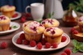 Delicious raspberry muffins dessert concept in cozy home kitchen with copy space for text