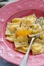 Delicious ravioli with parmesan and egg yolk.