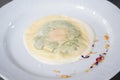 Delicious raviolo pasta on a creamy sauce. Italian Cuisine Royalty Free Stock Photo