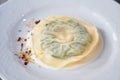 Delicious raviolo pasta on a creamy sauce. Italian Cuisine Royalty Free Stock Photo