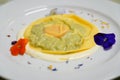 Delicious raviolo pasta on a creamy sauce. Italian Cuisine Royalty Free Stock Photo