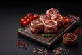 Delicious raw fresh pork or chicken meat rolls wrapped in bacon Royalty Free Stock Photo