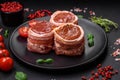 Delicious raw fresh pork or chicken meat rolls wrapped in bacon Royalty Free Stock Photo