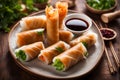 delicious ready to eat asian spring rolls in a dish over a dark wooden table, editorial style
