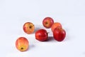 Delicious red apples on the table with side view on white background