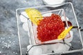 Delicious red caviar in bowl, Close-up salmon caviar. Delicatessen. Gourmet food. Seafood. appetizer, selective focus, place for Royalty Free Stock Photo