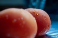 Red tomatoes with water droplets on them