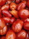 Delicious red tomatoes. Summer tray market agriculture farm full of organic vegetables It can be used as background. selective Royalty Free Stock Photo