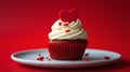 Delicious red velvet cupcake topped with creamy frosting and a heart, perfect for valentine's celebration. tempting Royalty Free Stock Photo