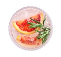 Delicious refreshing drink with sicilian orange, fresh rosemary and ice cubes in glass isolated on white, top view Royalty Free Stock Photo